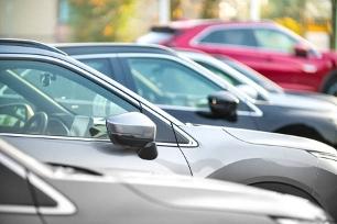 Image of cars parked on a street