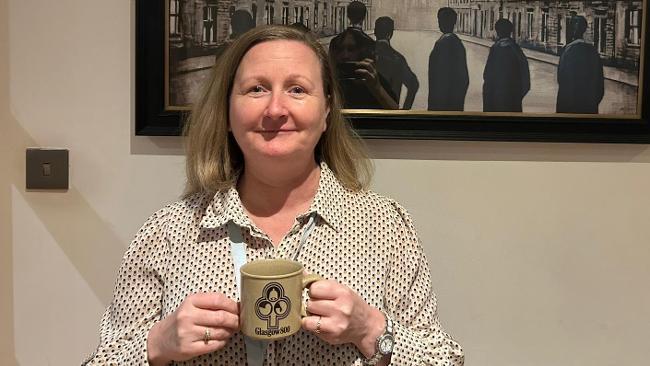 Angela with special commemoration mug